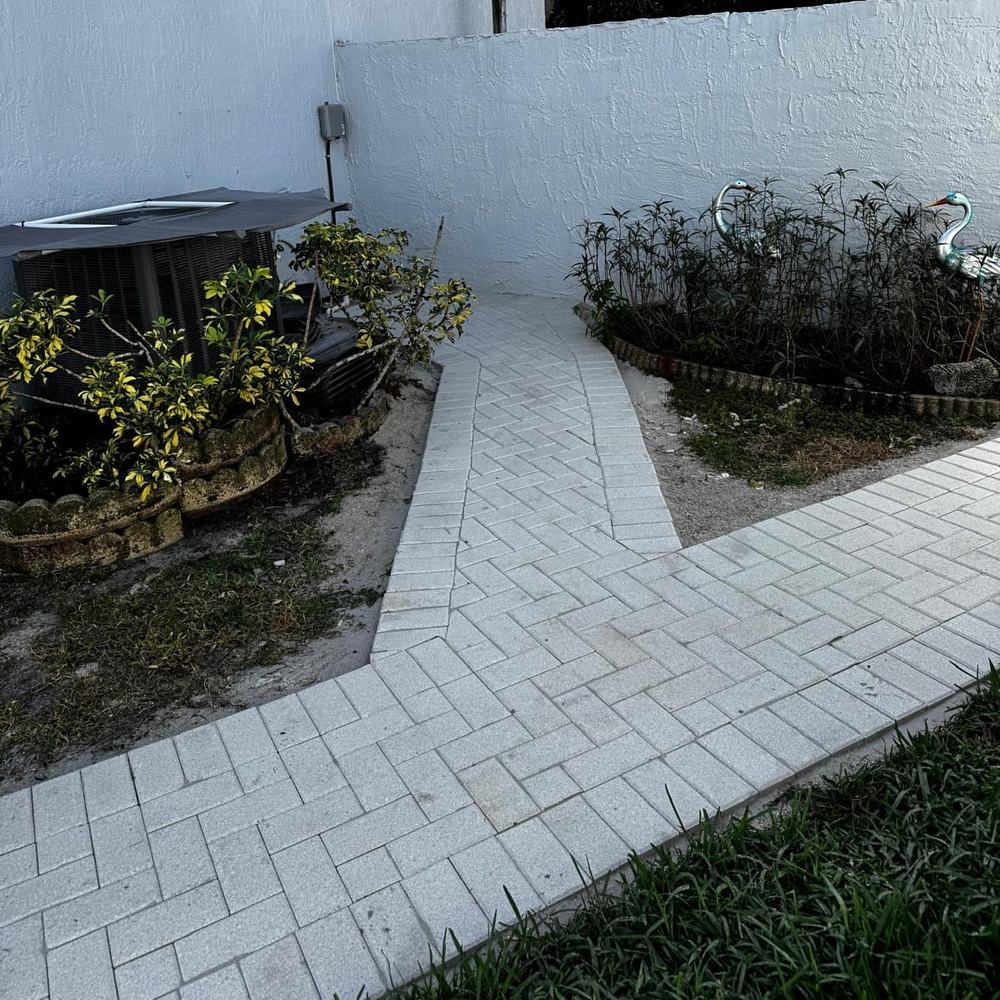 Completed paver walkway installation at a Wellington, FL home